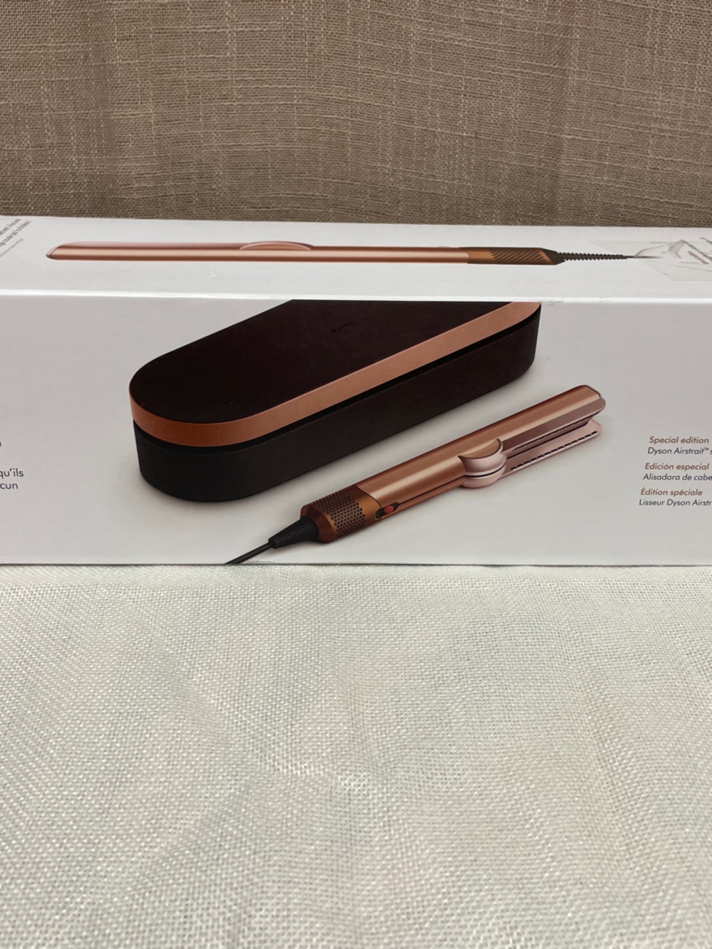 Dyson Airstrait straightener in special edition color amber silk